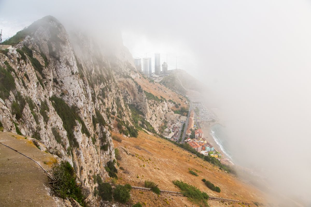The Rock of Gibraltar rising through sea mist