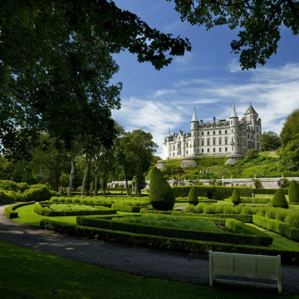 Dunrobin Castle rising above its formal gardens