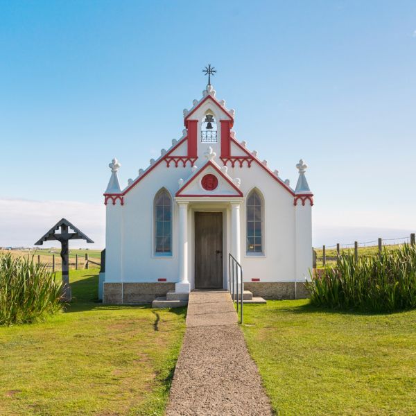 The white and red fa&ccedil;ade of Orkney's Italian Chapel