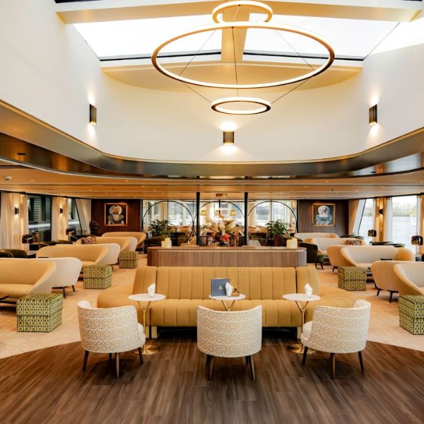 The Nobleman's elegant atrium lounge with sculptural lighting and warm contemporary interiors