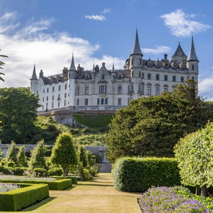 Dunrobin Castle rising above its formal gardens