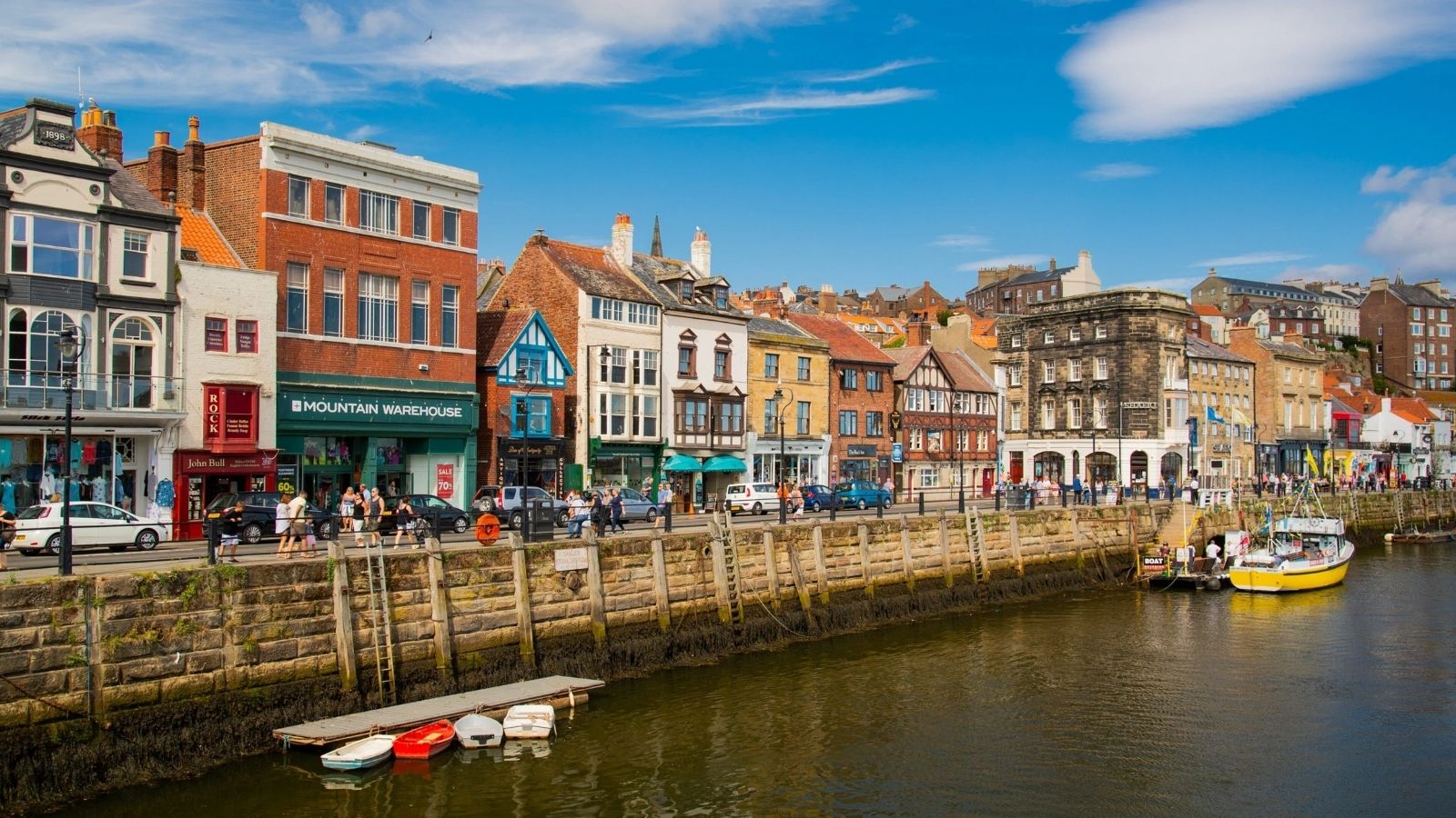 Whitby&rsquo;s waterfront buildings and boats in the harbour
